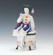 A Fantasy Costume Figural Tobacco Jar