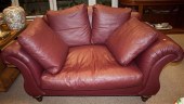 Red leather sofa Estimate $ 150-250