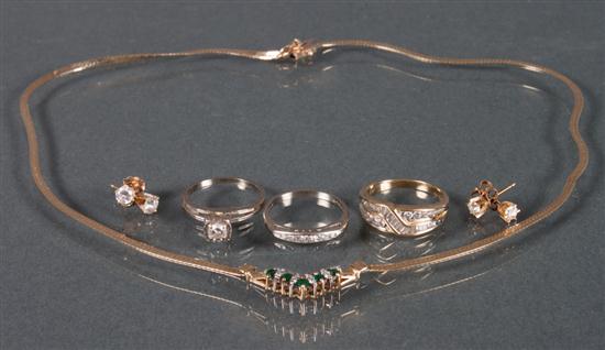 Group of gold and diamond jewelry including:
