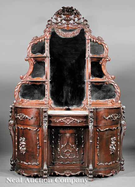 An American Rococo Carved Mahogany Étagère