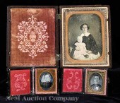 [Cased Images] a group of three daguerreotypes