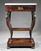 An Empire Carved Mahogany Inlaid and
