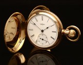 An Elgin 18K gold pocket watch The white