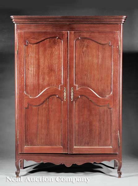 A West Indies Carved Courbaril Armoire in