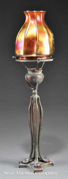 A Tiffany Favrile Glass and Patinated 142176