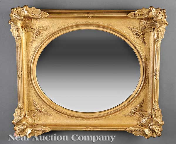 An American Rococo Carved Giltwood Mirror