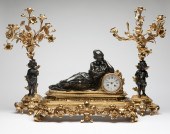 A French patinated and gilt bronze mantel