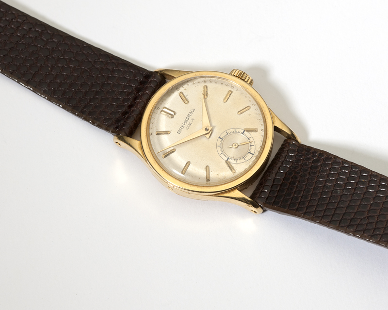 A gentleman s 18K gold wristwatch 14230a