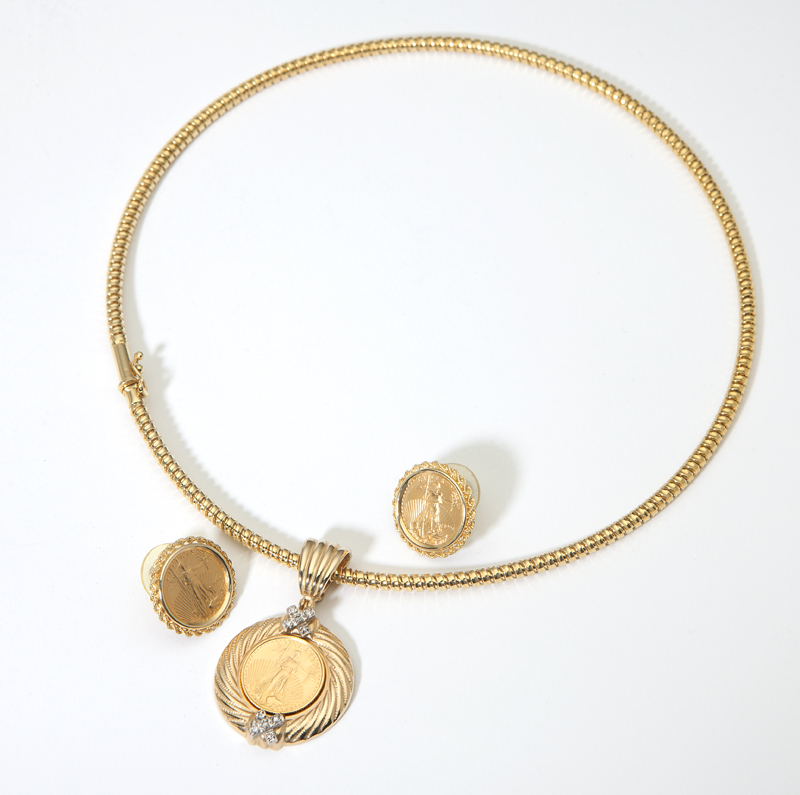 A gold coin pendant and earrings 142319