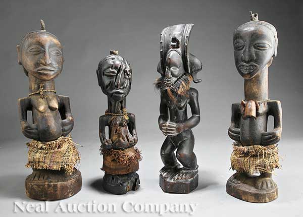 A Pair of African Carved Wood Figures the