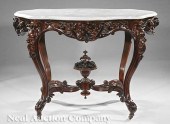 A Fine American Rococo Carved Rosewood