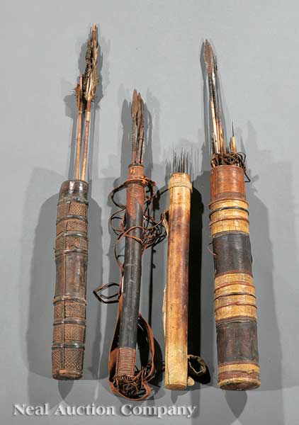 A Group of Four West African Carved Wood