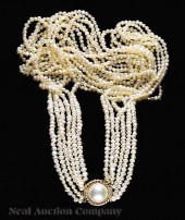 A Triple Strand Necklace of Freshwater 14098a