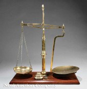 An Antique English Brass Scale marked