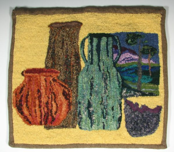 Hand hooked rug featuring pottery 143a98