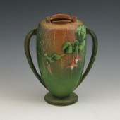 Roseville Fuchsia handled vase in green.