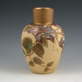 Unusual Owens vase best described as