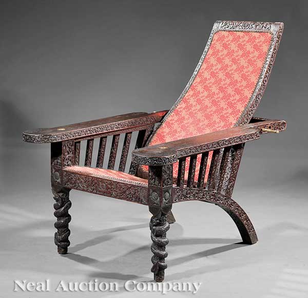 An Anglo-Colonial Carved Hardwood Reclining
