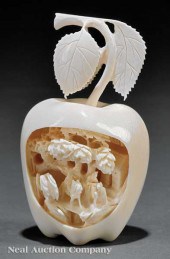 A Chinese Ivory Apple realistic form