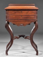 An American Rococo Carved Rosewood Work