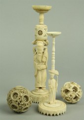 TWO SMALL CHINESE IVORY PUZZLE BALLS