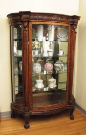 CARVED OAK TRIPLE BOW FRONT CHINA CABINET: