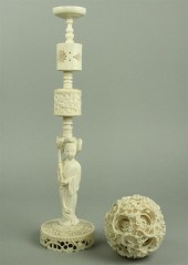 A CHINESE IVORY PUZZLE BALL ON STAND
