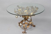 GLASS-TOPPED COFFEE TABLE WITH GOLD-COLORED