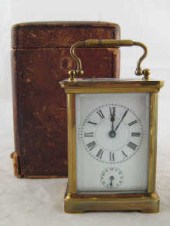 A French brass carriage clock alarm