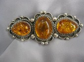 Amber Brooch trio of golden cabachons