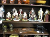 Collection of 9 Santa Figurines Pere