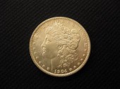 1904-O Morgan Silver Dollar gem uncirculated.