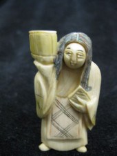 Carved Ivory Netsuke of Man revealing