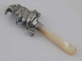 A silver childs Punch rattle with