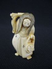 Carved Ivory Netsuke of a Woman happy