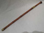 A Chinese bamboo sword stick with brass
