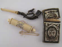 An ivory and white metal cigarette 14f139