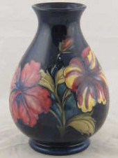 A Moorcroft vase decorated with Hibiscus