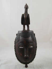 An African tribal mask surmounted 14f303