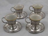A set of four china tea cups with American