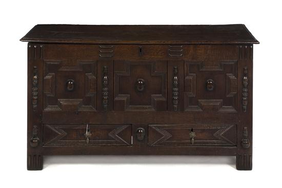 A Charles II Style Oak Coffer the hinged