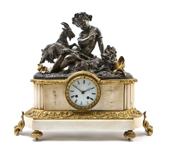 *A Continental Bronze and Marble Mantel Clock