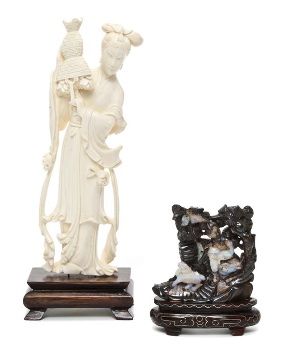 *A Chinese Carved Ivory Figure