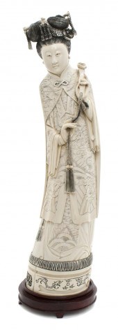 A Carved Chinese Ivory Figure of a Lady