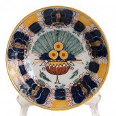 A Dutch Peacock Tin Glazed Pottery Plate