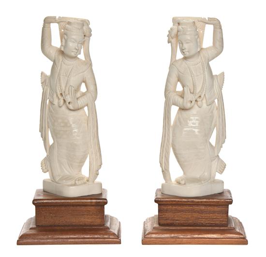 *A Pair of Burmese Carved Ivory Figures depicting
