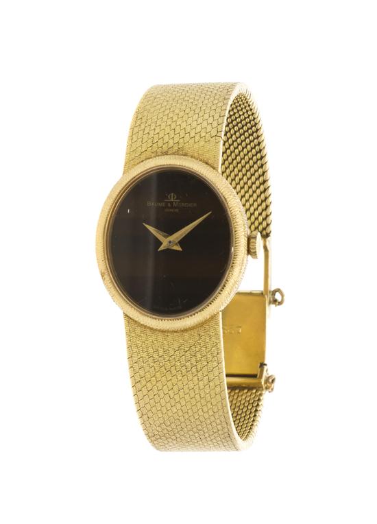 An 18 Karat Yellow Gold Wristwatch 155148