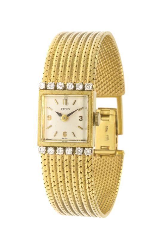 An 18 Karat Yellow Gold and Diamond Wristwatch