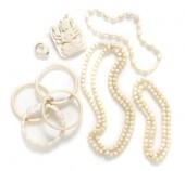 * A Collection of Ivory Jewelry consisting