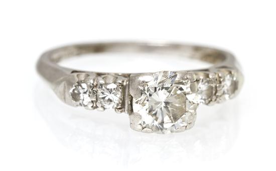 A Platinum and Diamond Ring containing